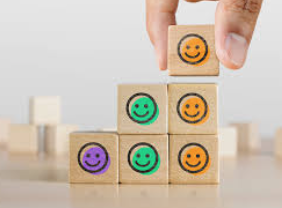 Emojis representing different moods on building blocks. 